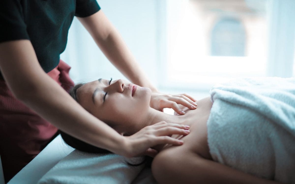 Woman Recieving Massage | Thai Massage | Remedial Massage