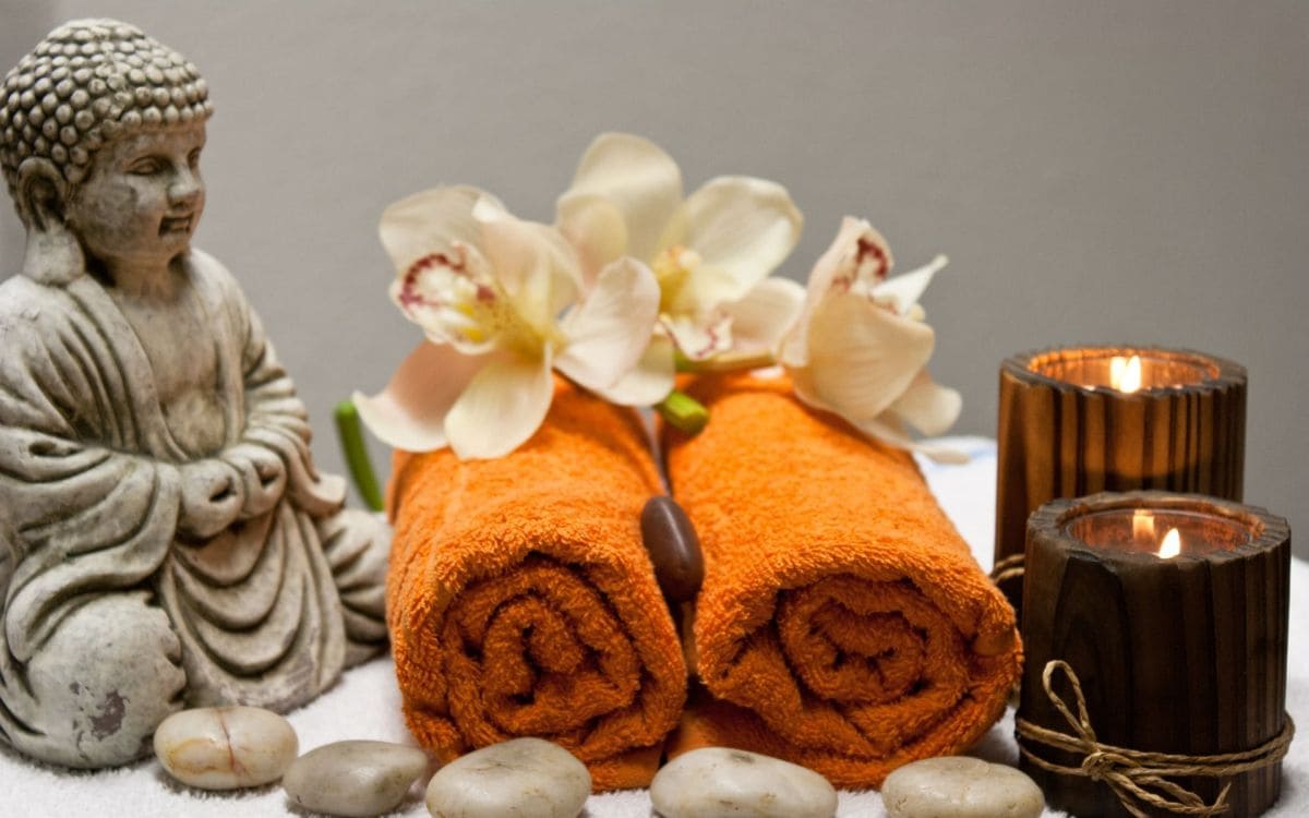 Buddha | High Quality Products | Orange Towels | BeachFront Massage Therapy